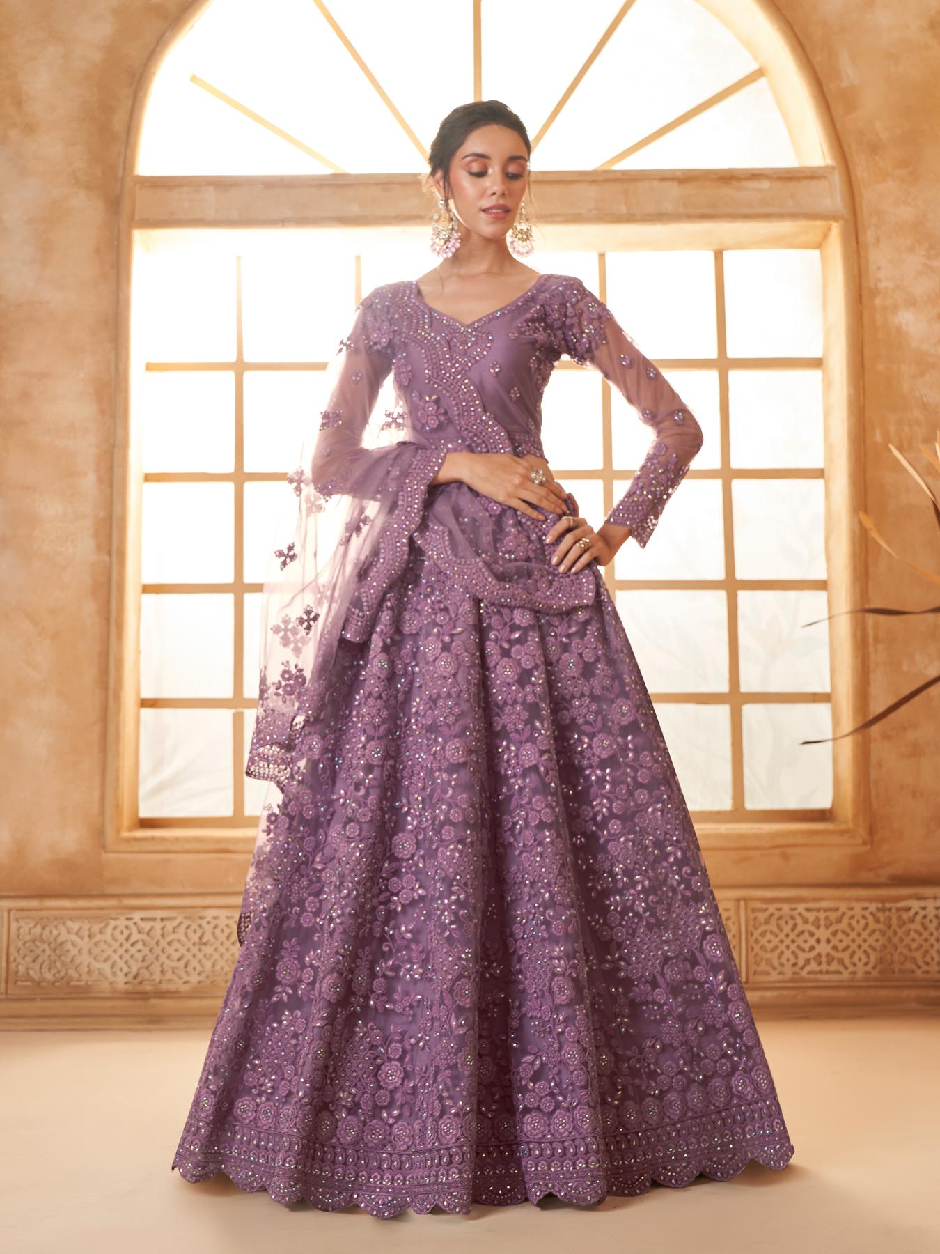 Purple Heavy Embroidered Net Lehenga Choli With Dupatta