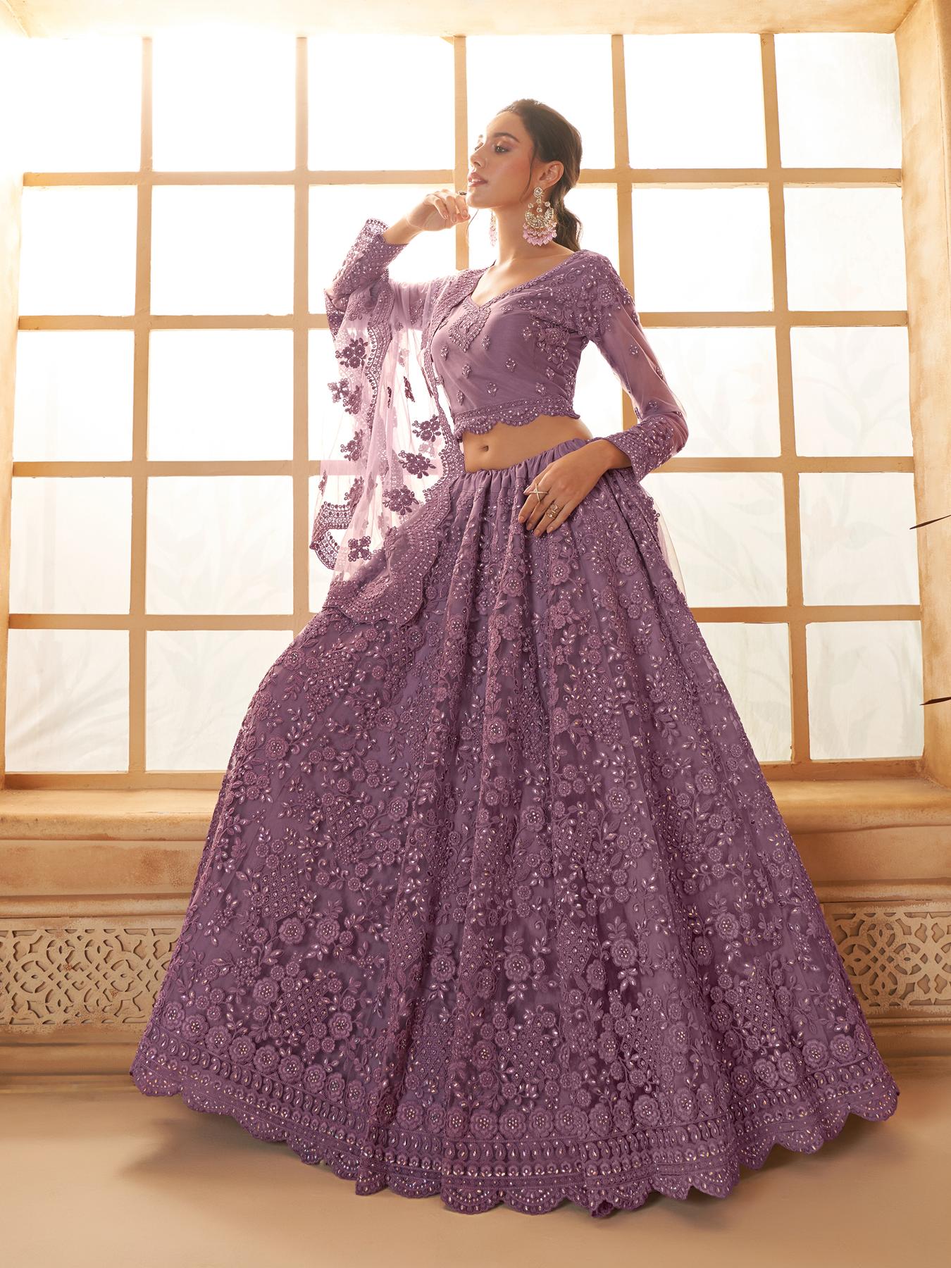 Purple Heavy Embroidered Net Lehenga Choli With Dupatta