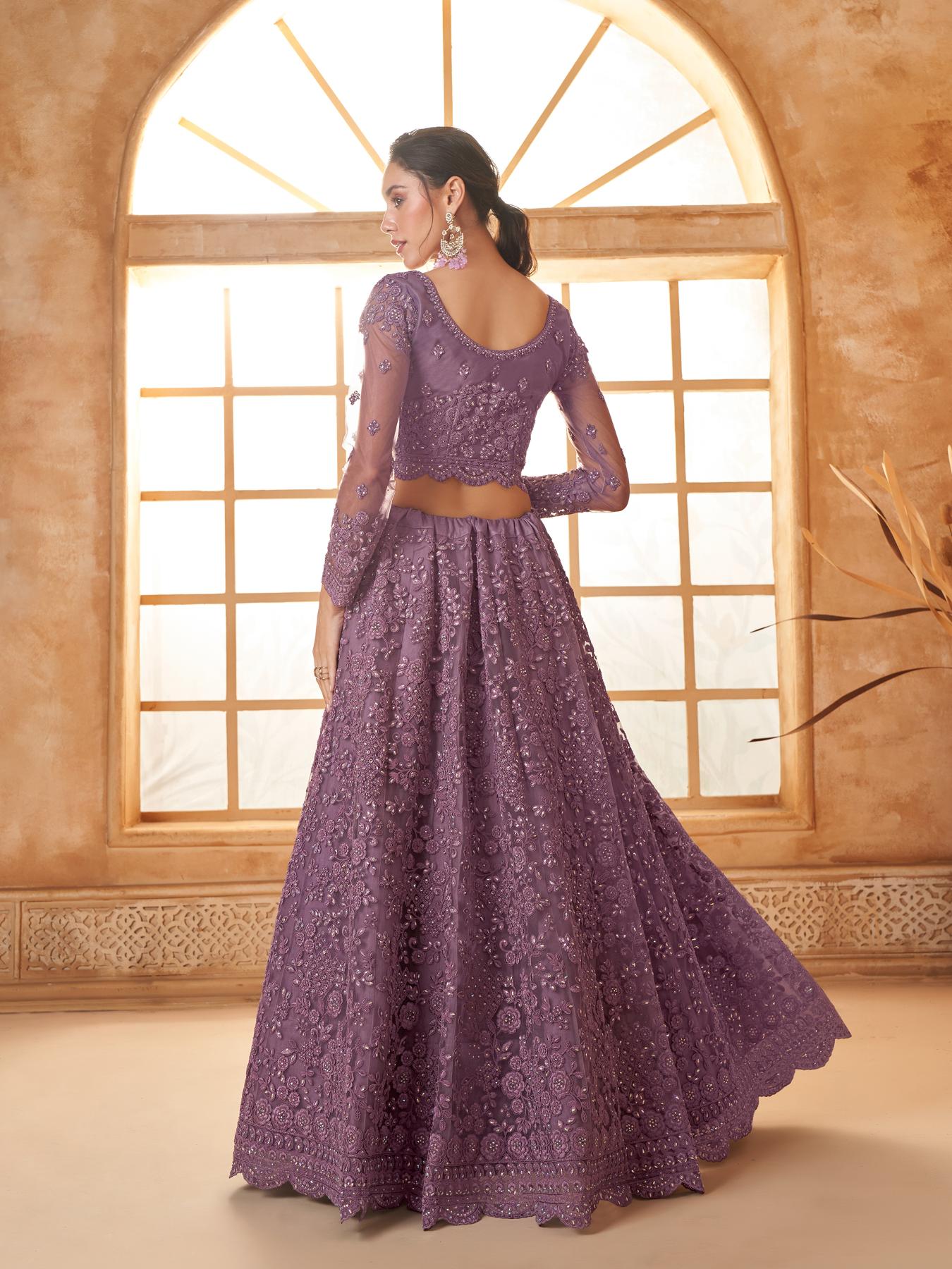 Purple Heavy Embroidered Net Lehenga Choli With Dupatta