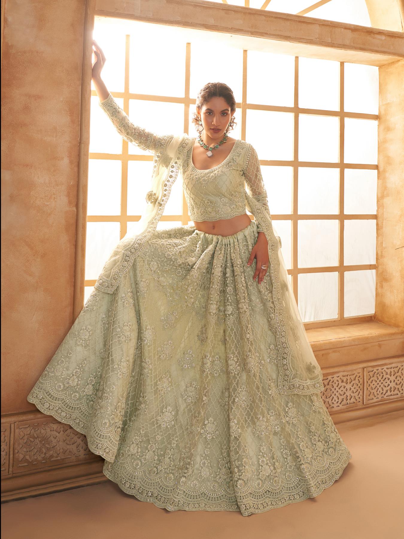 Pista Green Heavy Embroidered Net Lehenga Choli With Dupatta