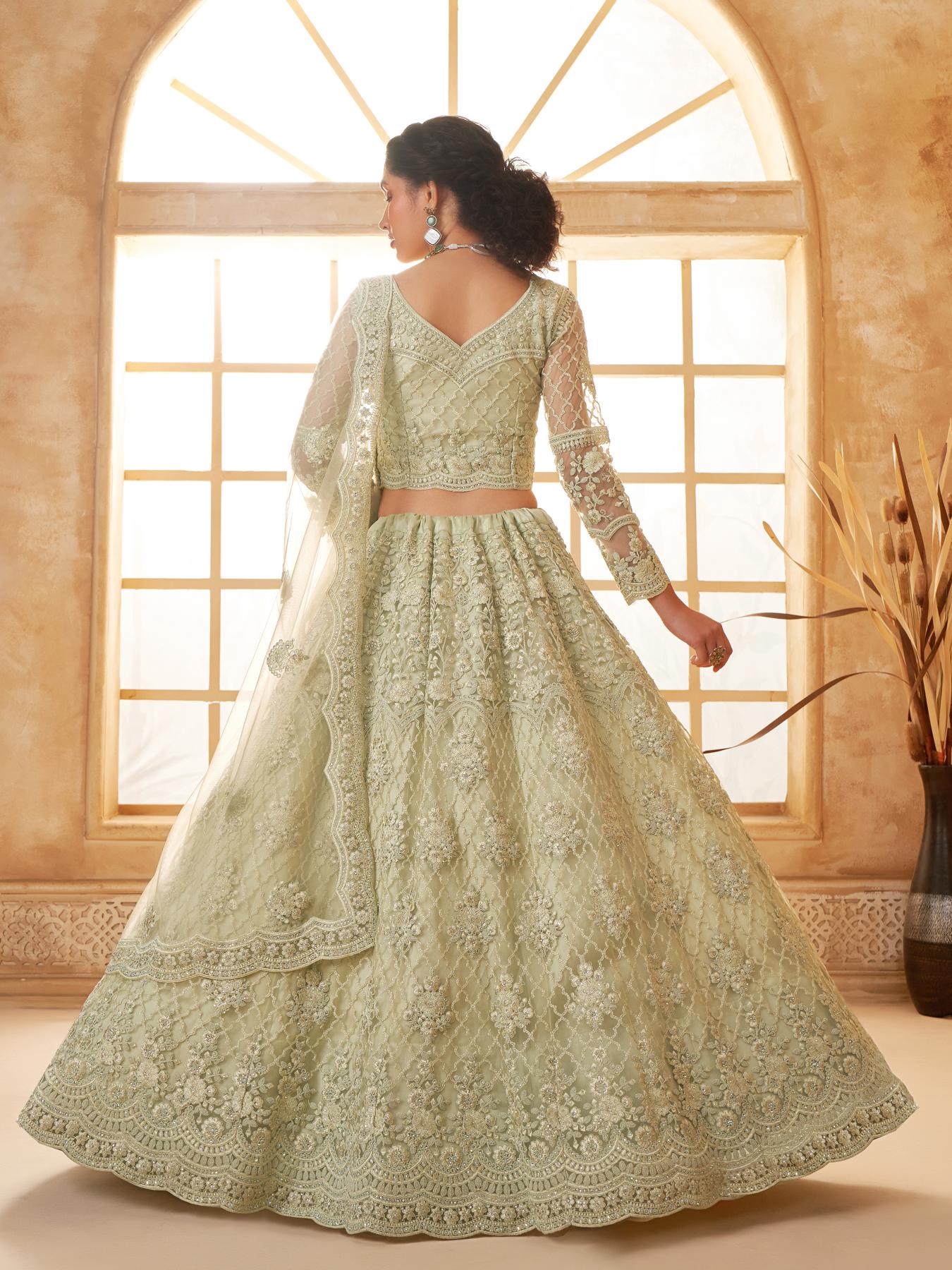 Pista Green Heavy Embroidered Net Lehenga Choli With Dupatta