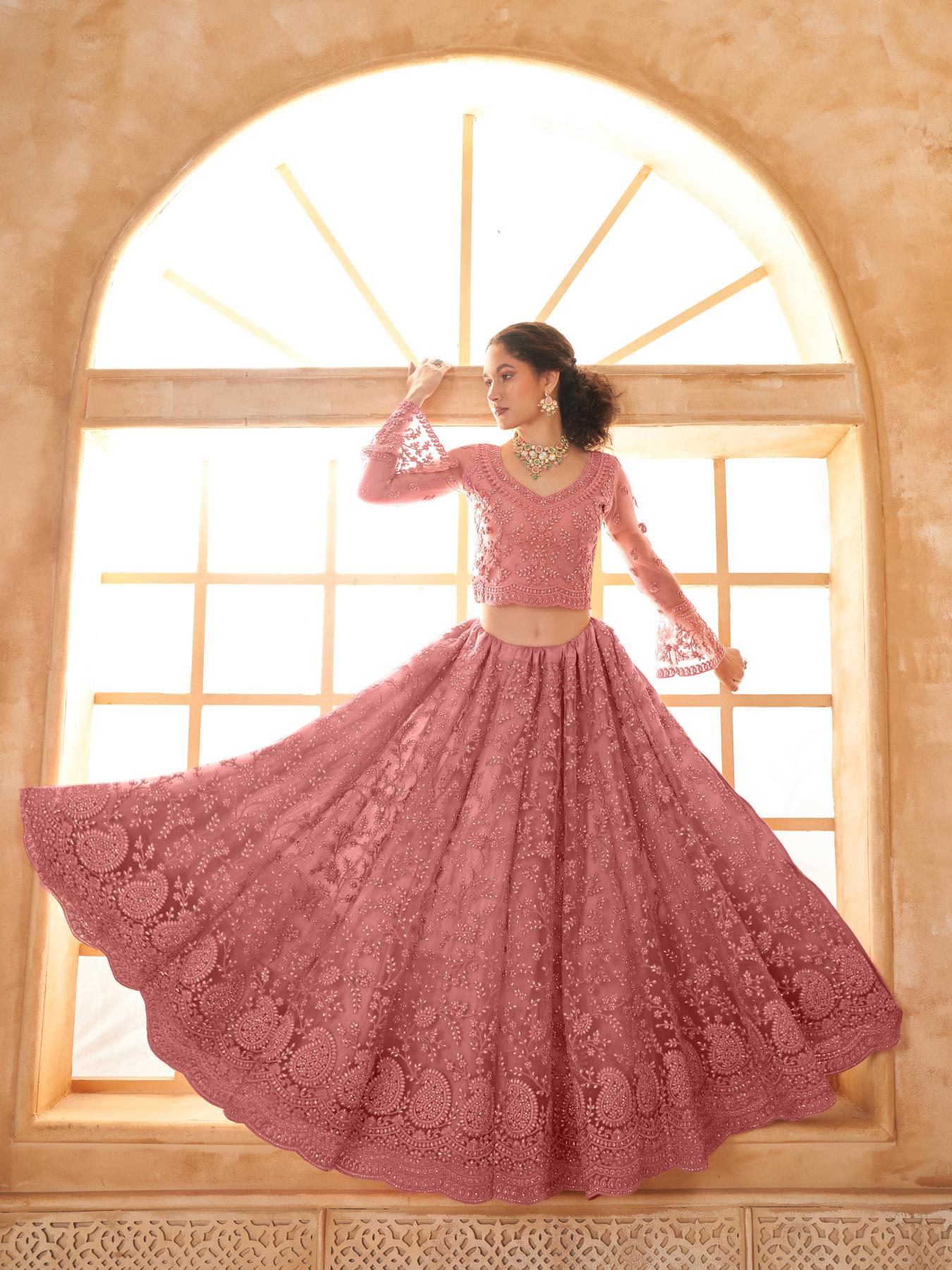 Carrot Pink Heavy Embroidered Net Lehenga Choli With Dupatta