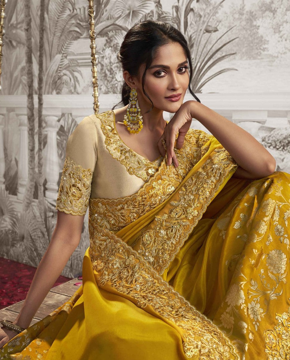 Festive Yellow Heavy Embroidered Designer Silk Saree