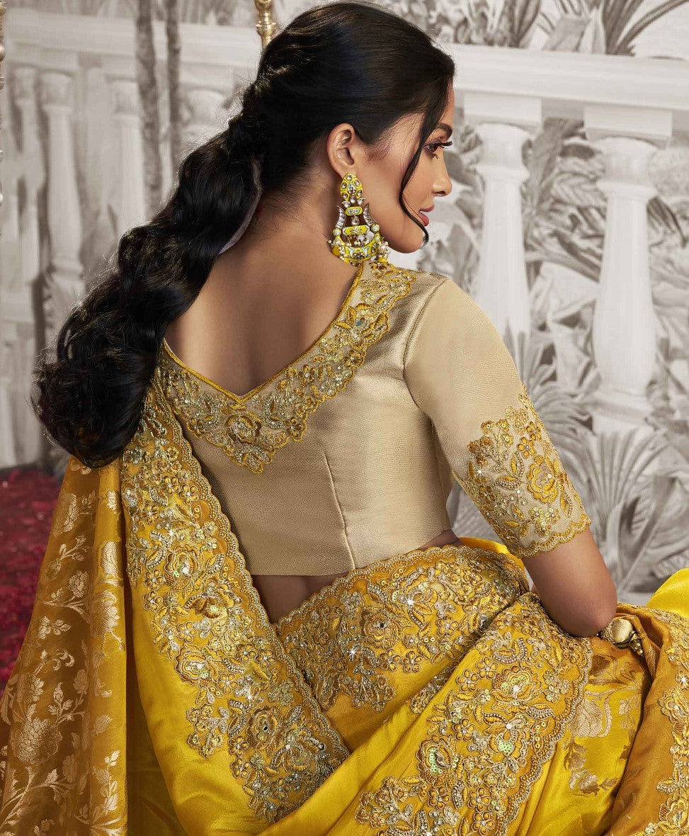 Festive Yellow Heavy Embroidered Designer Silk Saree