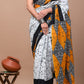 White & Orange Printed Handloom Cotton Mulmul Saree