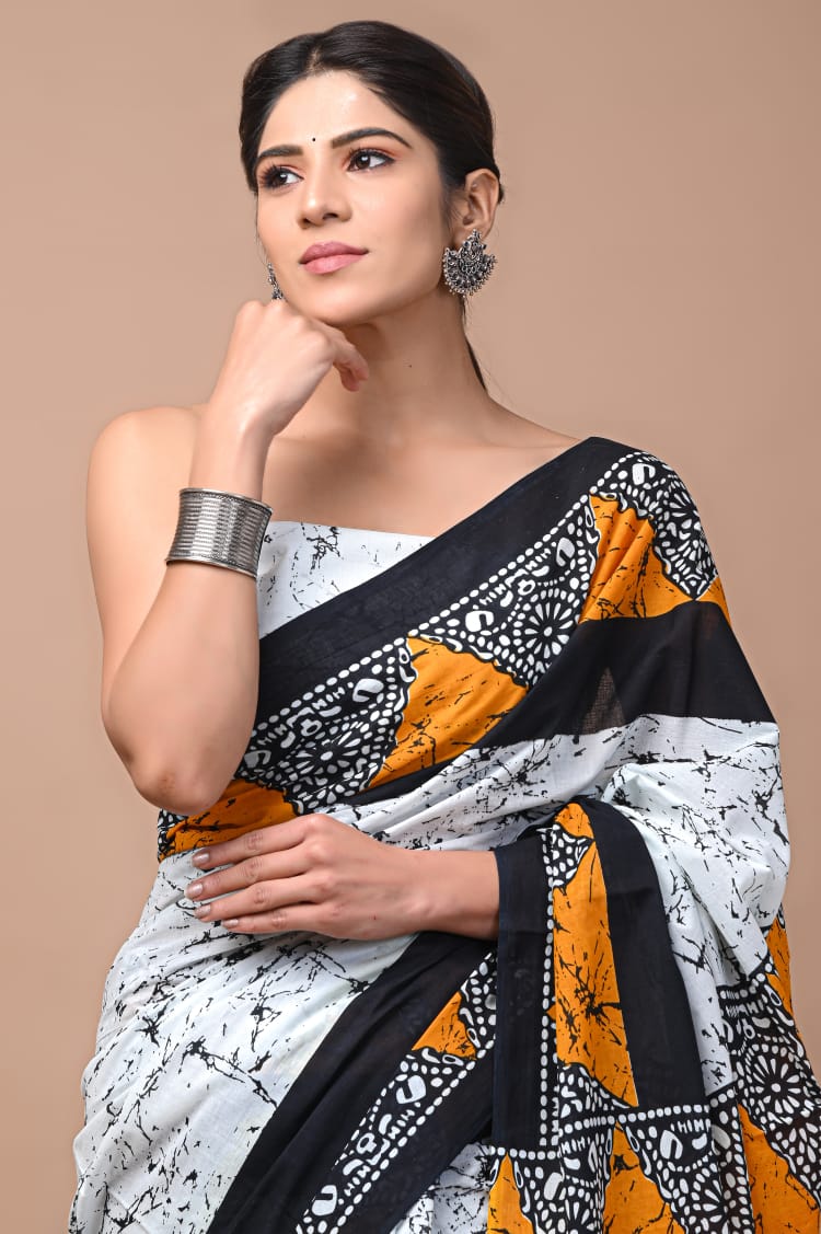 White & Orange Printed Handloom Cotton Mulmul Saree