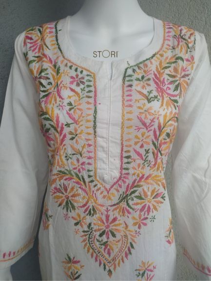 Avanya White Soft Cotton Chikankari Kurti With Multicolor Thread EmbroideryAvanya White Soft Cotton Chikankari Kurti With Multicolor Thread Embroidery