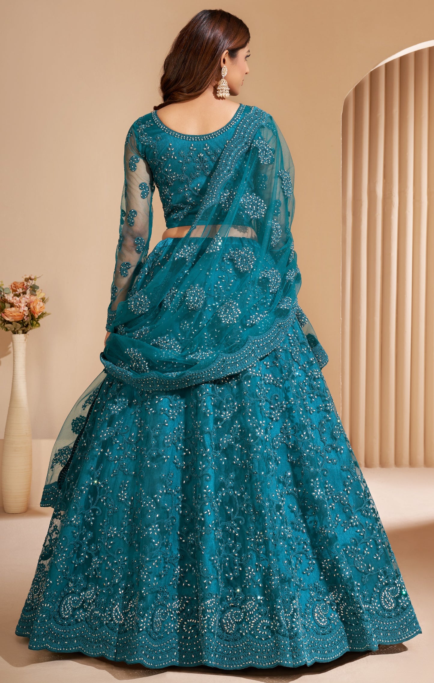 Peacock Blue Heavy Embroidered Net Lehenga