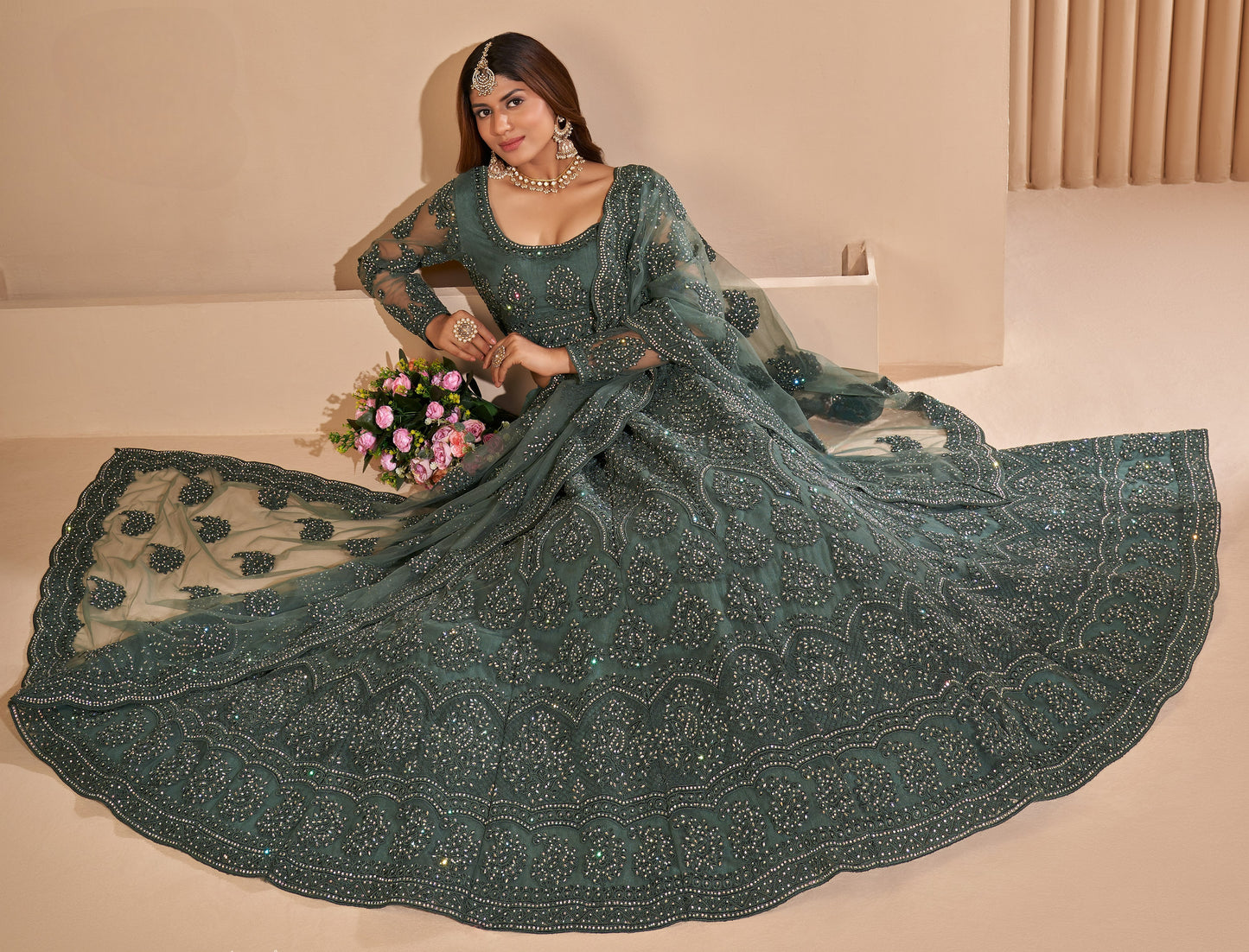 Seaweed Green Heavy Embroidered Net Lehenga