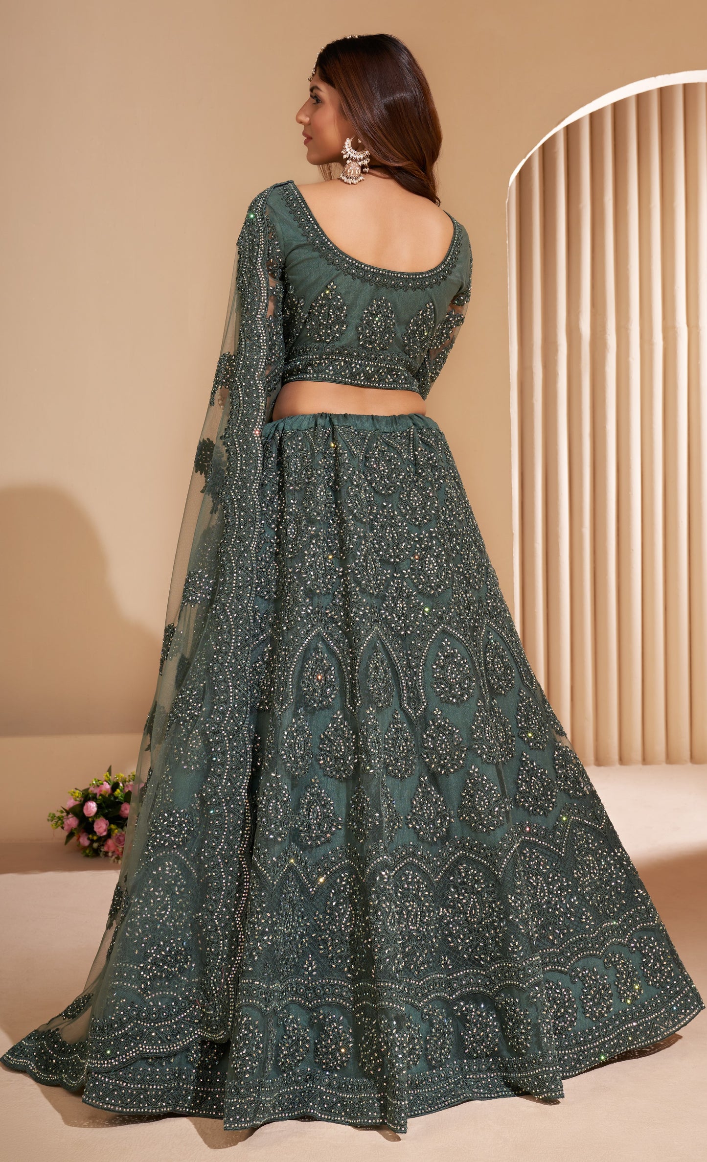 Seaweed Green Heavy Embroidered Net Lehenga