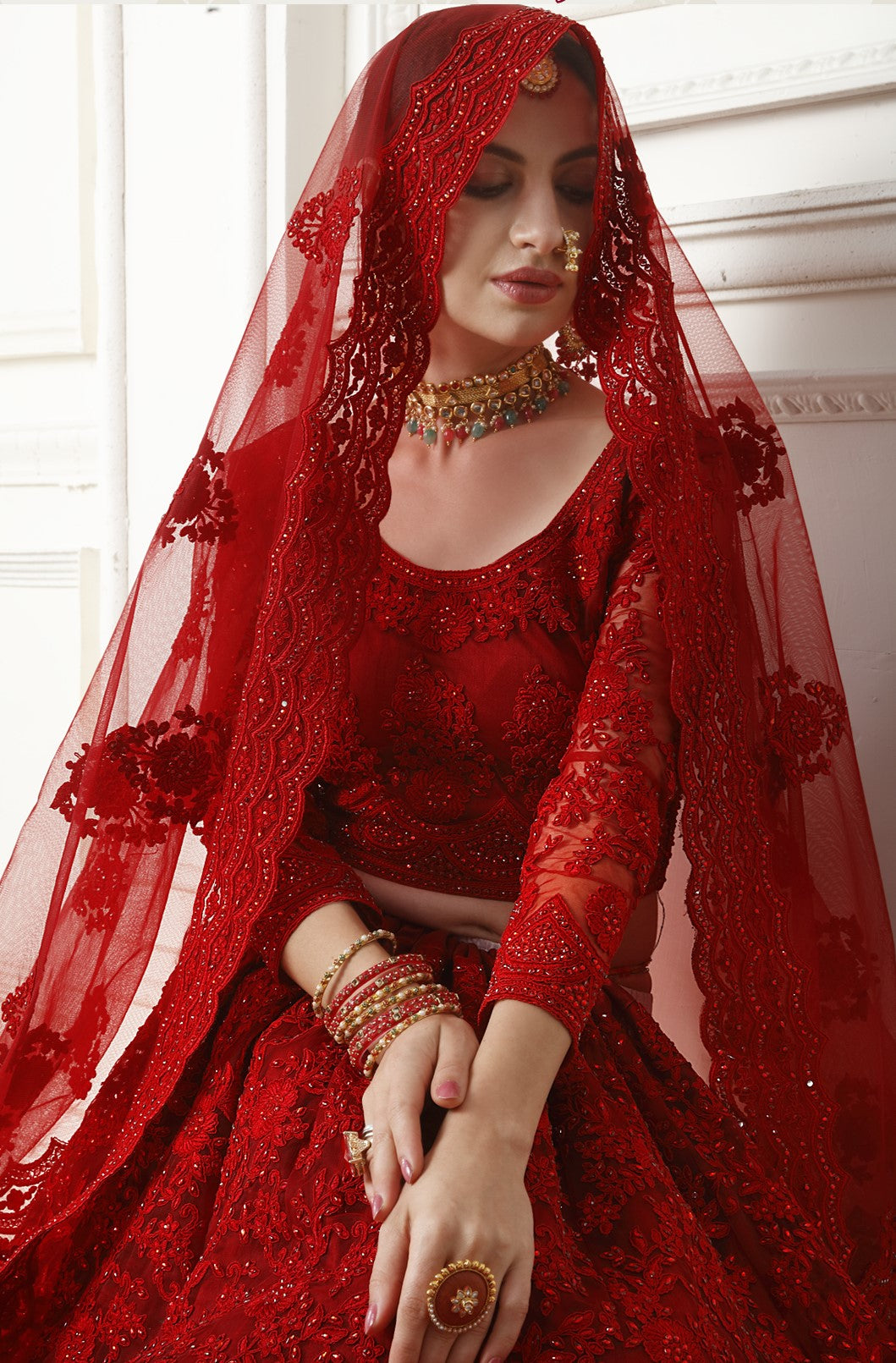 Scarlet Red Heavy Embroidered Net Lehenga