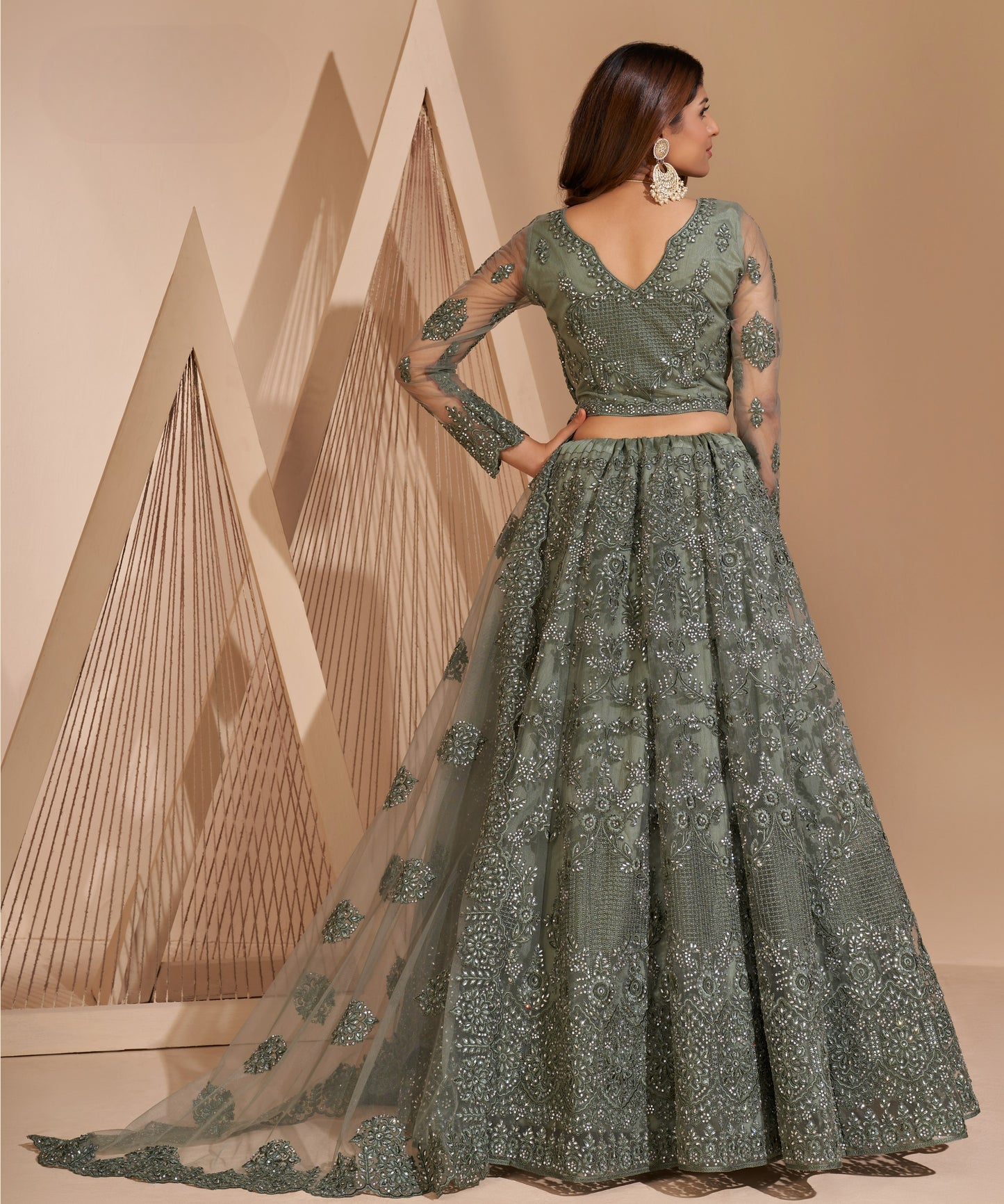 Smoky Green Heavy Embroidered Net Lehenga