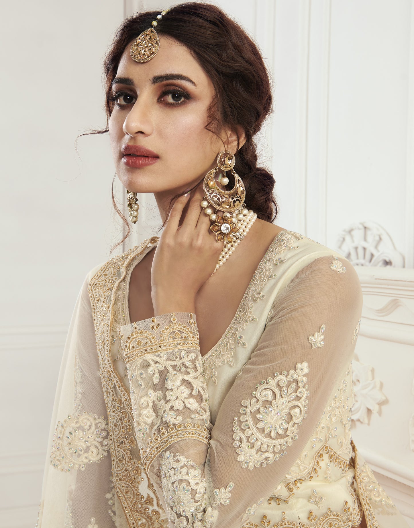 Ivory White Heavy Embroidered Net Bridal Lehenga