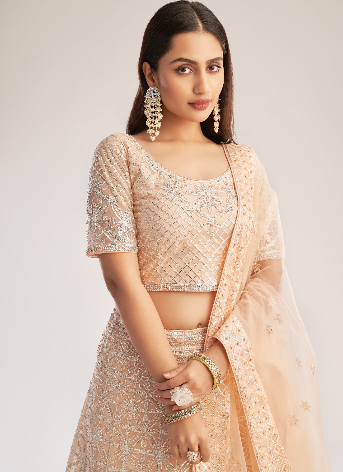 Cantaloupe Peach Heavy Embroidered Net Bridal Lehenga