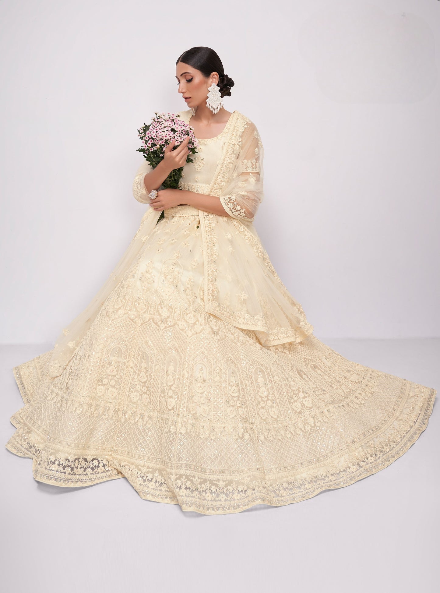 Ivory White Embroidered Net Lehenga