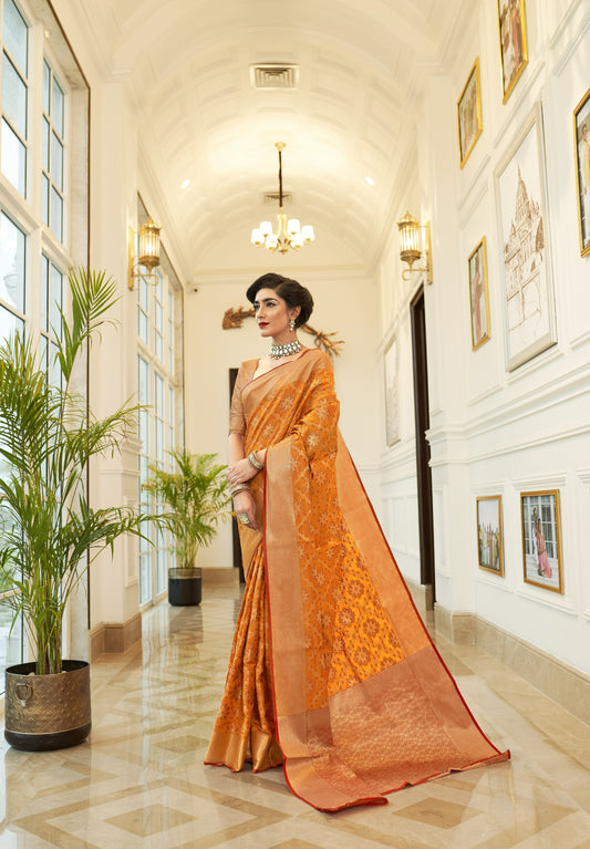 Citrus Orange Weaved Patola Silk Saree