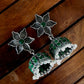 Daksha Floral German Silver Jhumki Earrings