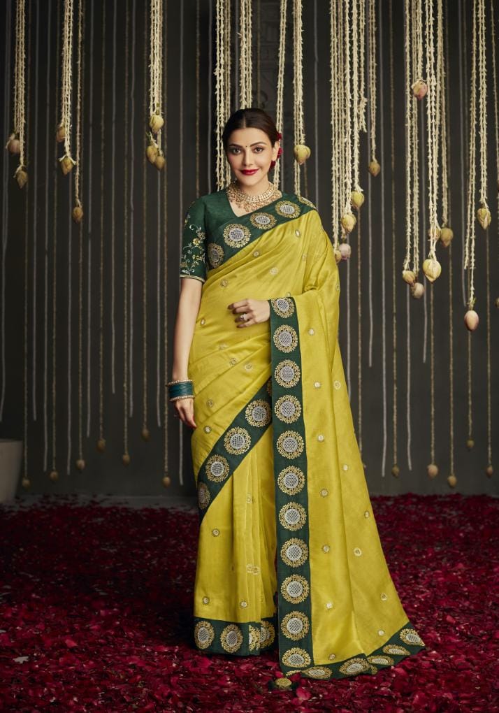 Biscotti Yellow Silk Saree With Designer Blouse